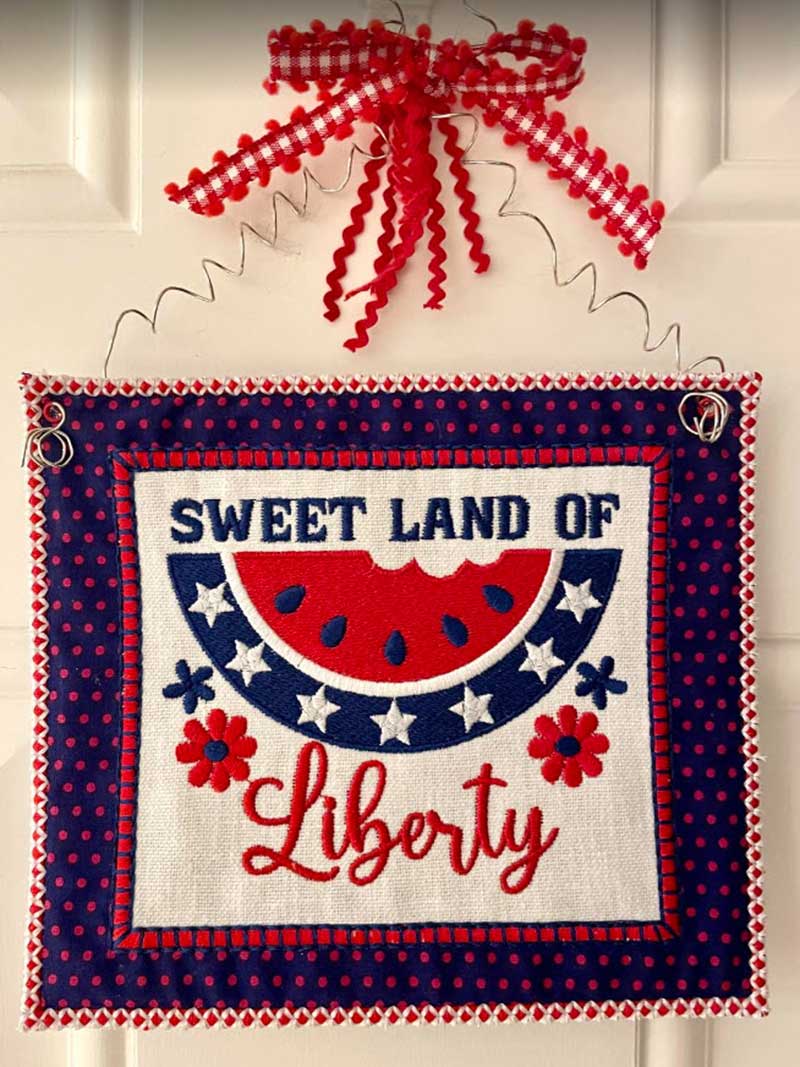 Sweet land of liberty wall hanger